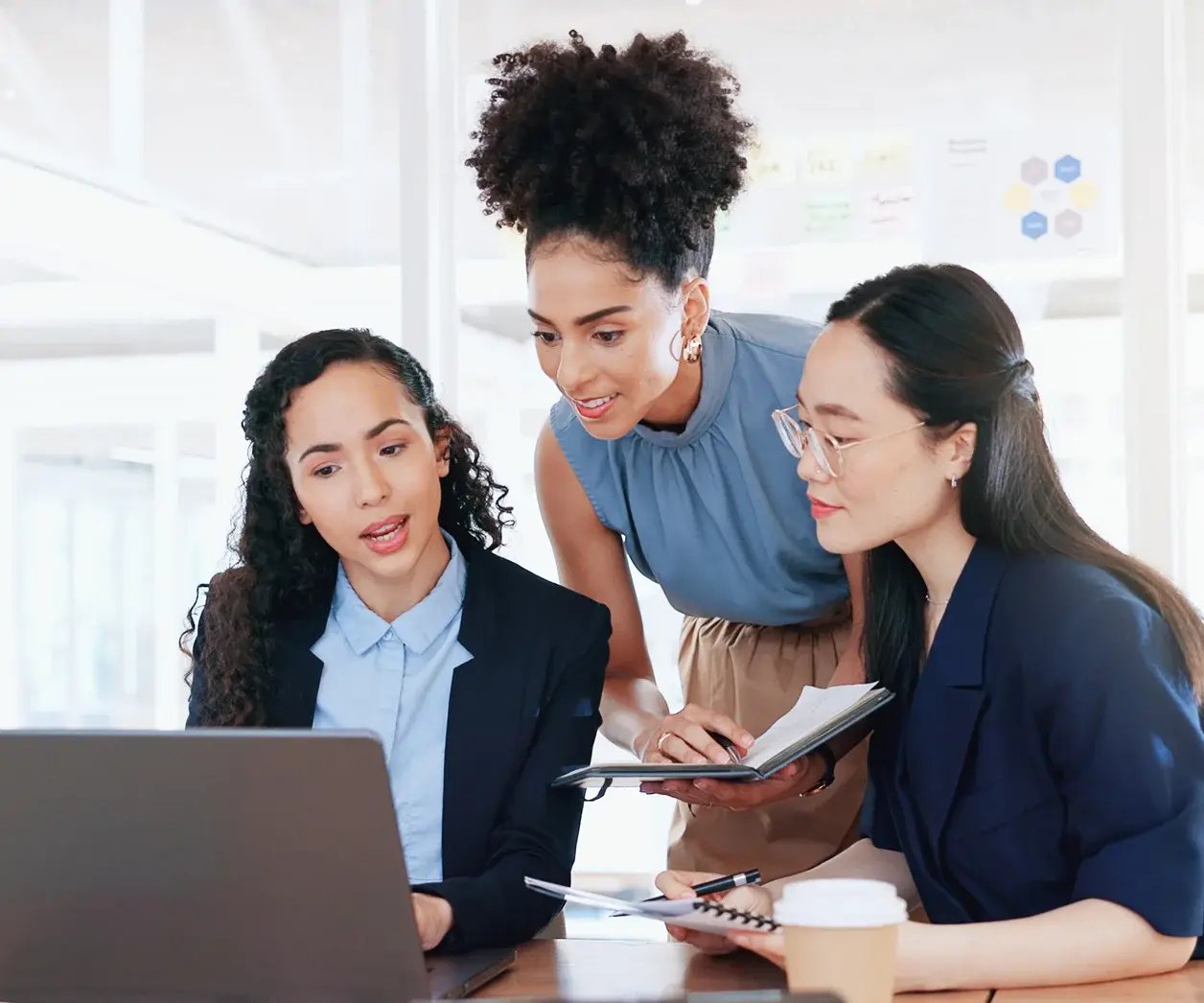 Colleagues looking at laptop