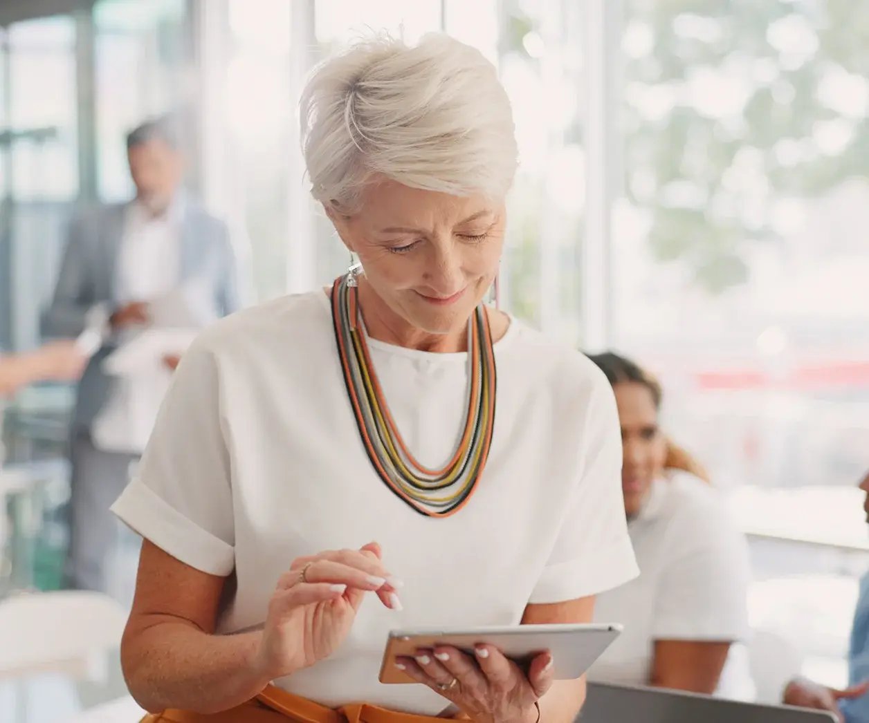 Lady in lobby using ipad