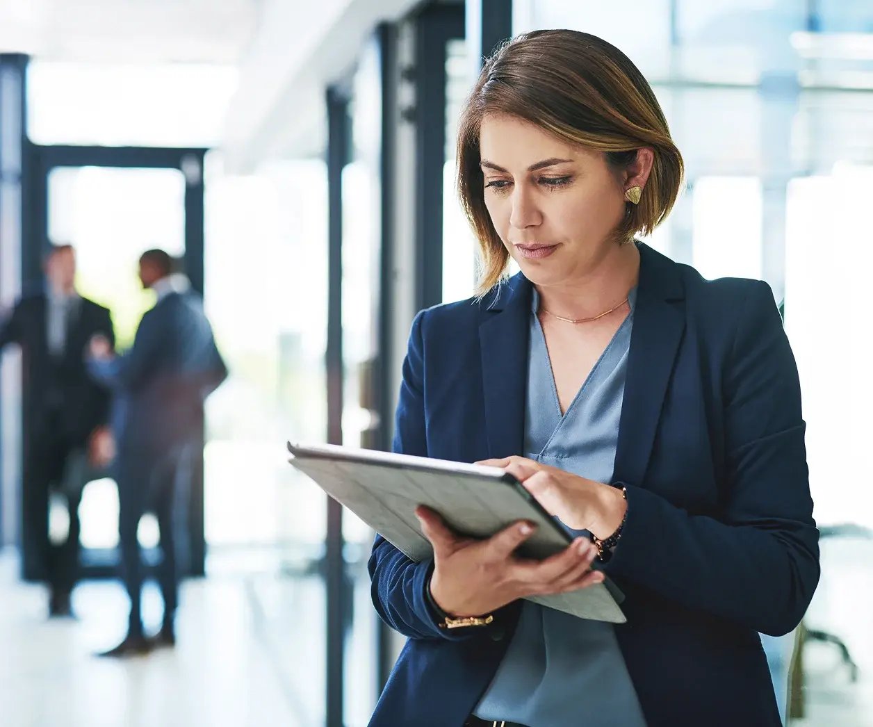 lady-on-tablet-in-office-medium