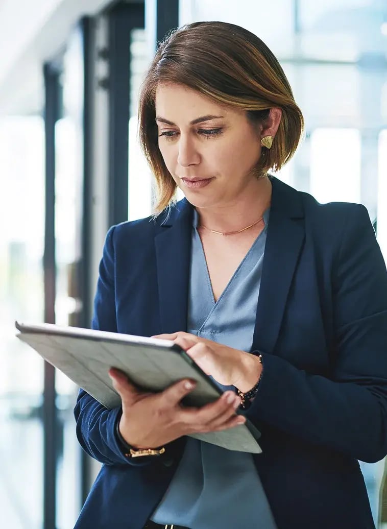 lady on tablet in office