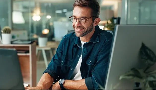 man at desk in office